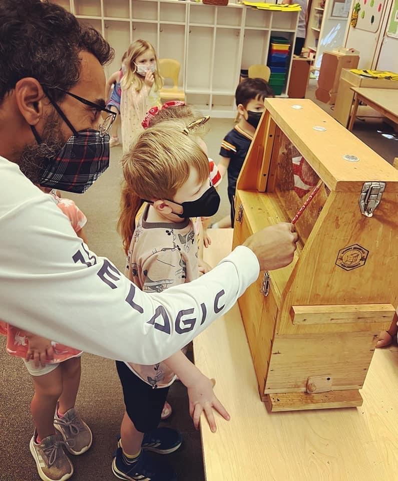 Pollinator presentation to elementary schools using an observation hive.