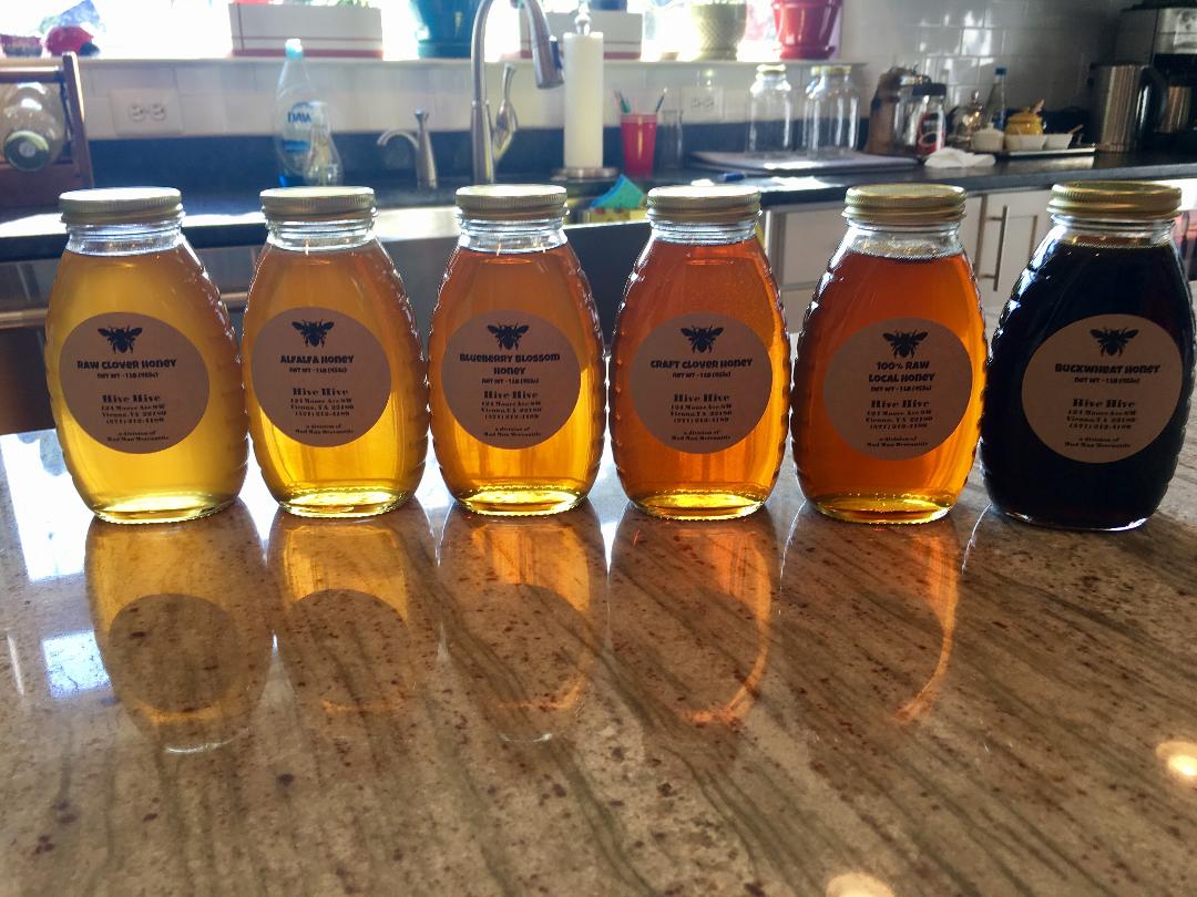 Honey varieties.  Different in color purely based on the flowers the honeybees visited to make it.